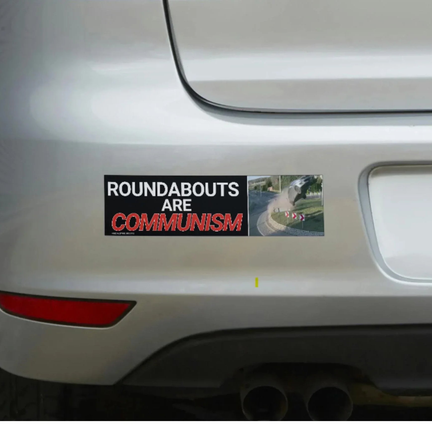 Weatherproof vinyl bumper sticker on car reading 'Roundabouts are Communism' with traffic roundabout image.