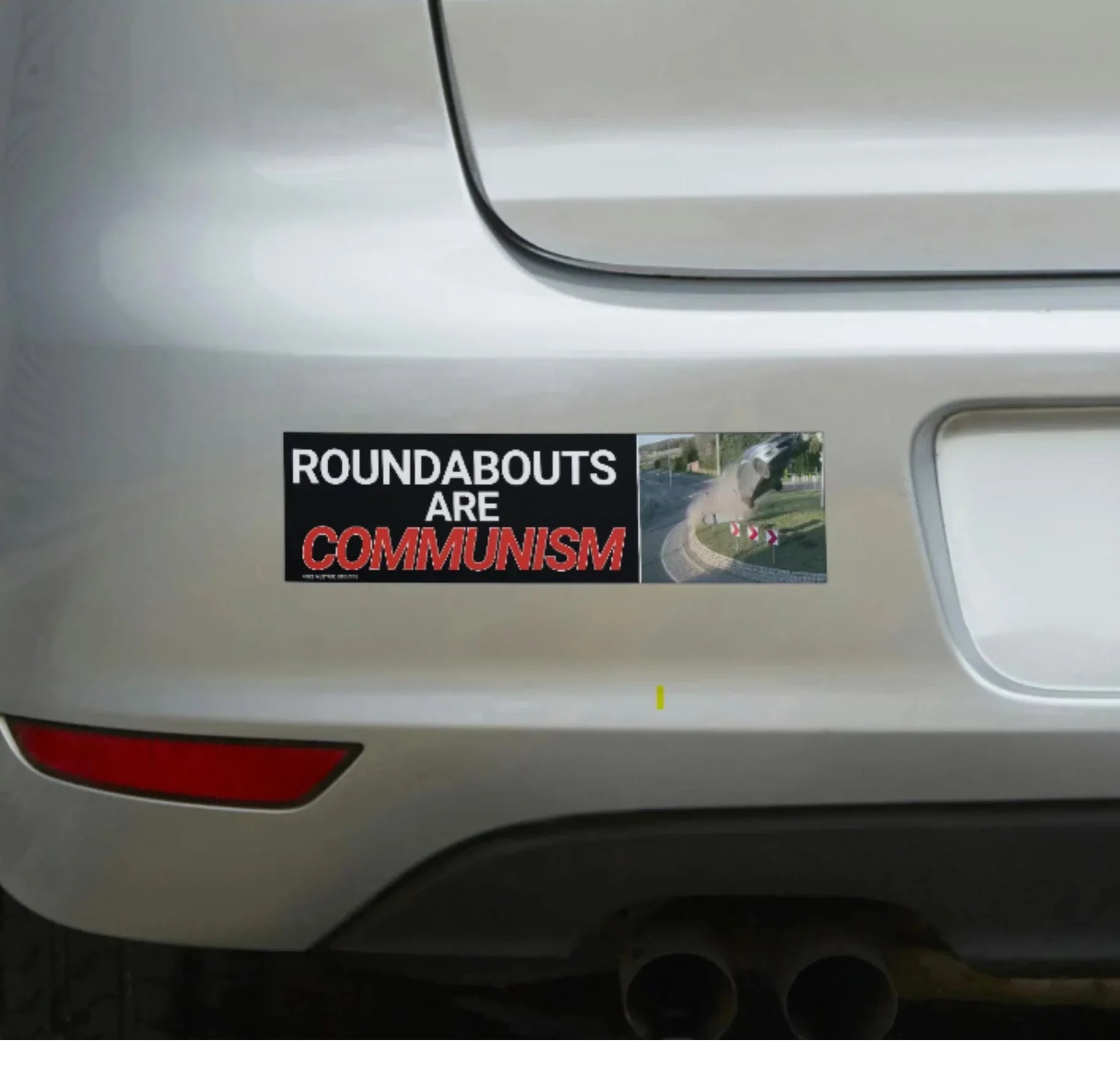 Weatherproof vinyl bumper sticker on car reading 'Roundabouts are Communism' with traffic roundabout image.