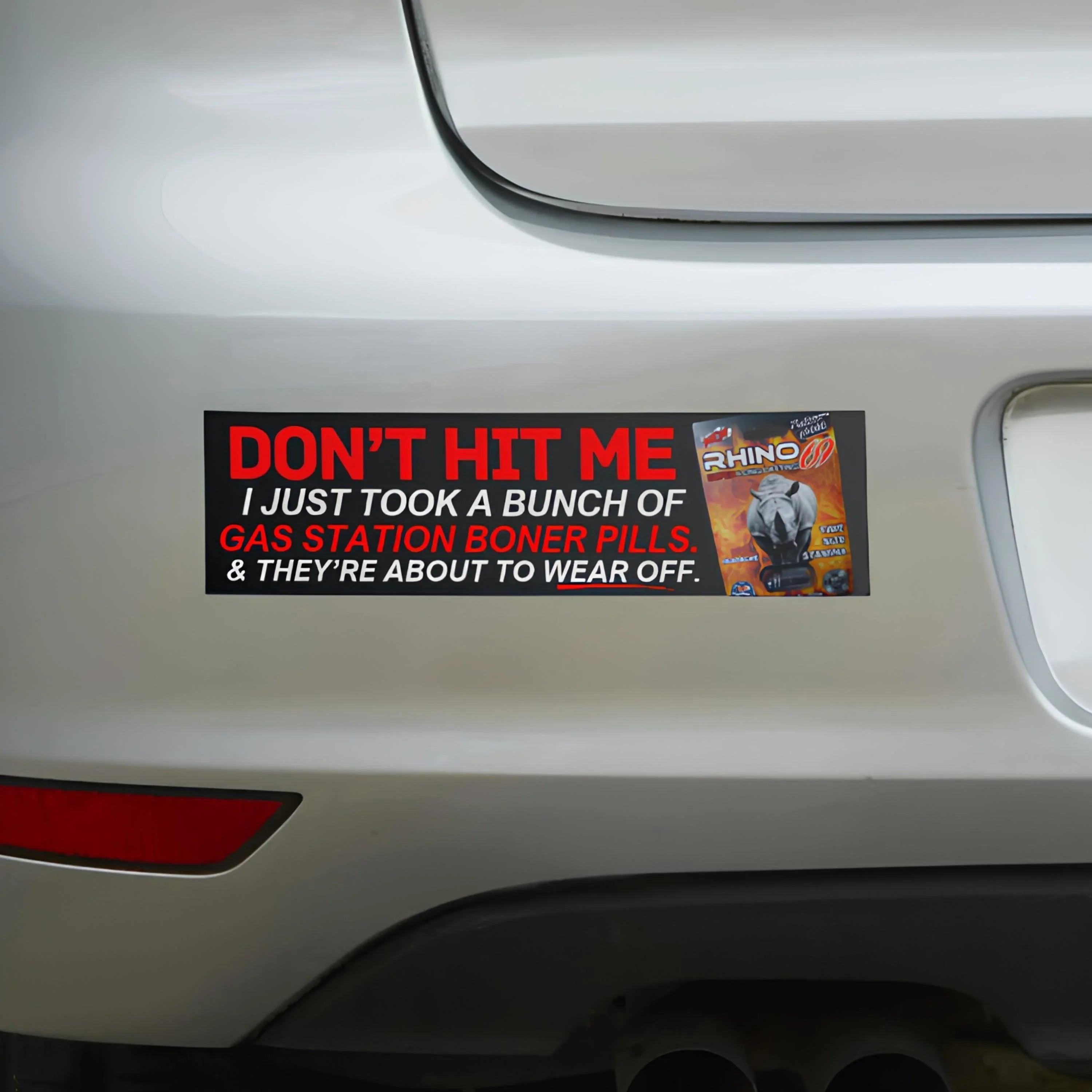 Funny car bumper sticker: 'Don't hit me, I just took a bunch of gas station boner pills.' Bold red text on black background, weatherproof vinyl.